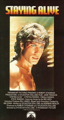 STAYING ALIVE/TRAVOLTA/RHODES/HUGHES