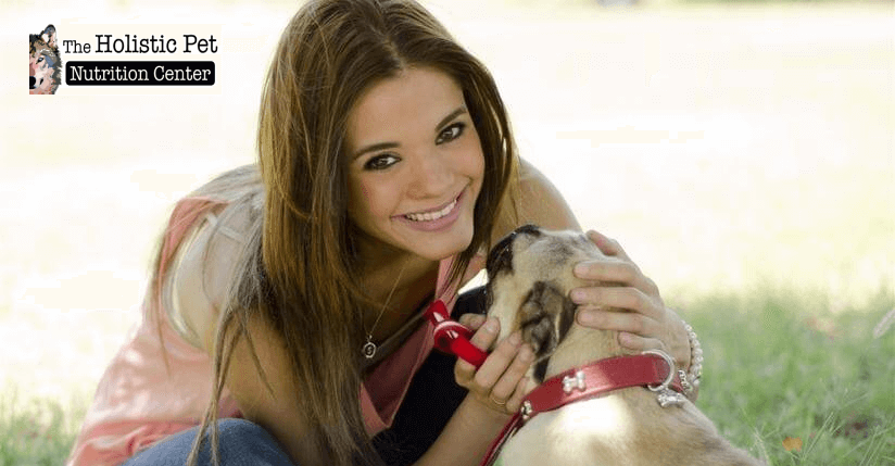 woman petting dog